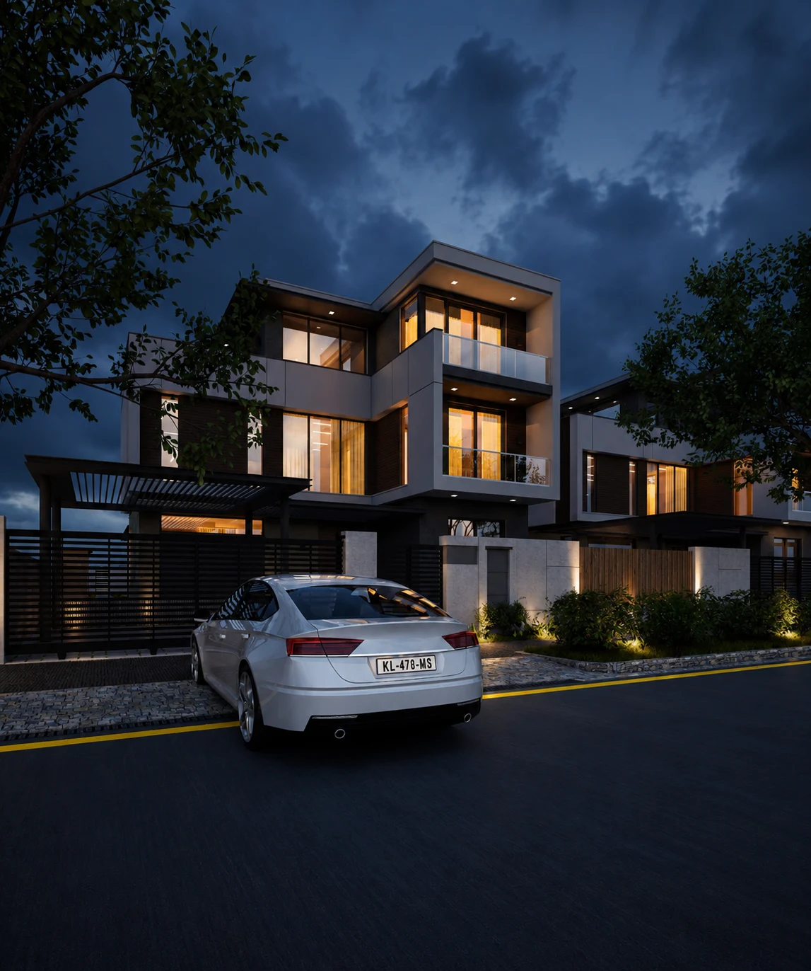 Contemporary residential villa at dusk with illuminated interiors